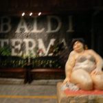 Fuzzy photo of entrance to Baldi Thermal Baths near the