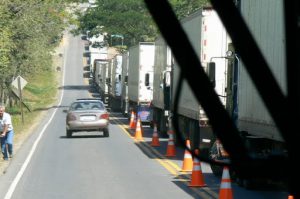 Bypassing long truck lines waiting for customs