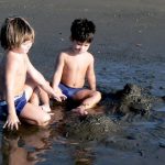 Kids building sand castles