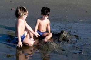 Kids building sand castles