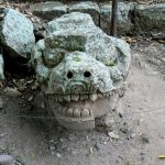 Carved stone head