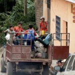 Kids hitching a ride to school