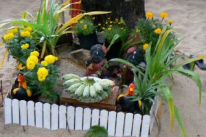 Shrine offering of food and flowers