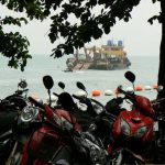 Motorbikes everywhere with dredge offshore