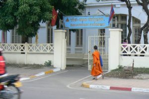 Monk passing National Library