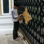 Painting gate at Presidential mansion