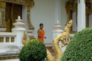 Monk leaving temple after ceremony