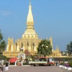 Pha That Luang national monument with statue of King Setthathirath