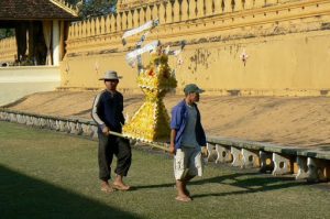 Ceremonial offering at Pha That Luang national monument in Vientiane