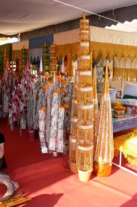 Blessing ceremony paraphernalia; people make merit by giving money or