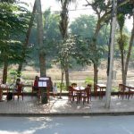 Dining tables along the Nam Khan river