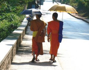 Monks protected from the hot sun