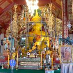 Golden Buddha under repair in main temple Wat Klang Wiang