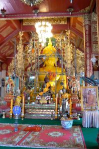 Golden Buddha under repair in main temple Wat Klang Wiang