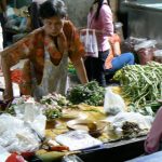 Vegetable vendor at covered market