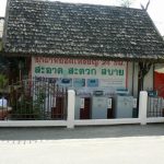 Coin operated outdoor laundromat, four machines