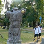 Torso sculpture with animal designs in Tung and Kim