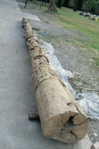 Carved totem pole in Tung and Kim Park