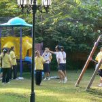 Students hang out in Tung and Kim Park after