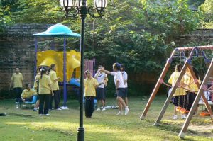 Students hang out in Tung and Kim Park after