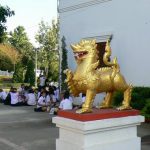 Golden lion and students in Tung and Kim Park