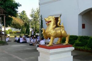 Golden lion and students in Tung and Kim Park