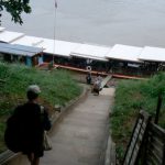 Approaching our boat on the Mekong River in Luang