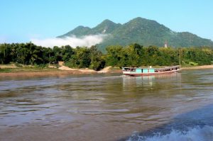 Moving north along the Mekong River after the morning mist