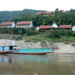 One of several tourist hotels along the river
