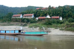 One of several tourist hotels along the river