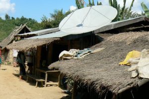 Some villages have satellite TV powered by car batteries