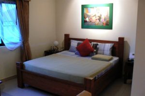 Typical bed at Sansuk Guesthouse