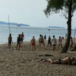 Volleyball game on gay beach