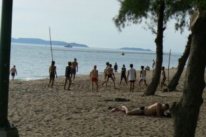 Volleyball game on gay beach