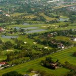 Aerial view of Bangkok area with golf course