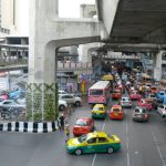 Colorful dense traffic along Sukumvit Road  (below the Skytrain superstructure)