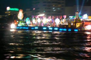 Fireworks and large illuminated rafts on the Chao Phraya River,