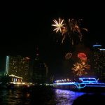 Fireworks and large illuminated rafts on the Chao Phraya River,