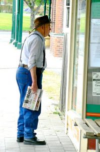 Local man checking out the local news.