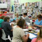 Scrapbook club in downtown in Queenstown on Saturday night