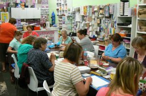 Scrapbook club in downtown in Queenstown on Saturday night