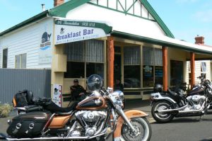 Moby Dick breakfast bar on main street in Stanley. A motorcycle