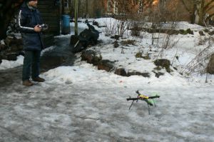 Playing with his home-made helicopter--it works.