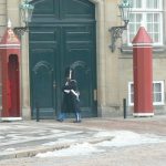 Royal guards patrol the Amalienborg Palace plaza