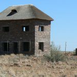 Abandoned thatch-roofed building in the plains