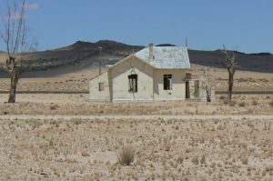 Abandoned train station; the railroad in the background is still