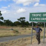 Tropic of Capricorn (monument on left in background); marks