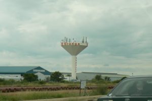 Water tower with cell phone transmitters on top
