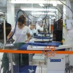 Brazil - Sao Paulo - workers in a laundry  along