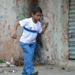 Boy dancer with the can band